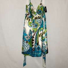 Brand New With Tags B Wear Too Byer California Juniors Summer Mini Dress With Belt. Blue-Green Floral Print, Adjustable Spaghetti Straps, Padding In Bust. Fully Lined, Ties In Back. 95% Polyester, 5% Spandex Department: Junior Size :9 Style: 1125a79 Green Spaghetti Strap Dress, 2000s Dress, Green Spaghetti, Summer Mini Dress, Vintage Mini Dresses, White Embroidered Dress, Beautiful Summer Dresses, Halter Top Dresses, Blue Summer Dresses