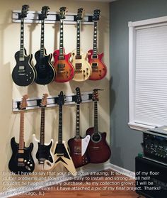 there are many guitars hanging on the wall