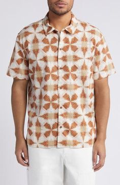 A distinctive geometric print neatly patterns a shirt made of linen and cotton with a hem designed specifically to be left untucked on sunny days. 29" length, 48" chest (size medium) Front button closure Spread collar Short sleeves Chest patch pocket 55% linen, 45% cotton Machine wash, tumble dry Imported Beige Printed Shirt With Relaxed Fit, Beige Printed Cotton Shirt, Beige Cotton Printed Shirt, Patterned Shirt With Spread Collar In Relaxed Fit, Patterned Shirt With Spread Collar And Relaxed Fit, Patterned Shirt With Relaxed Fit And Spread Collar, Patterned Linen Short Sleeve Top, Patterned Linen Tops With Short Sleeves, Casual Linen Patterned Shirt