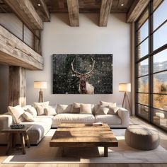 a living room filled with furniture and a large painting on the wall above it's windows