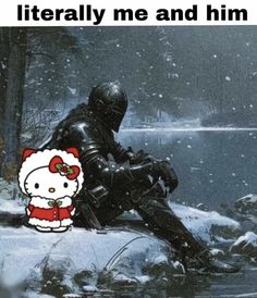 a person sitting in the snow with a hello kitty sticker on their knee and caption that reads, it literally me and him