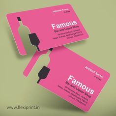 two pink business cards with wine bottle on them