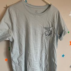 Size Xl Brand New Will Be Ironed Before Shipping Feel Free To Message Me With Offers Or Questions! Light Blue Graphic Print Top For Loungewear, Casual Light Wash Short Sleeve T-shirt, Light Blue Crew Neck T-shirt For Loungewear, Light Wash Graphic Tee With Crew Neck, Light Wash Graphic Tee With Short Sleeves, Light Blue Cotton T-shirt For Loungewear, Light Wash Crew Neck Top For Loungewear, Light Wash Cotton Tops For Loungewear, Ivory Ella