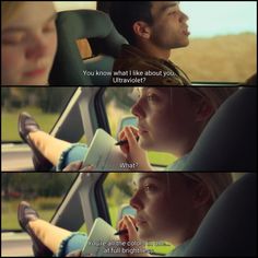 two people sitting in a car talking on their cell phones and one is holding a book