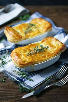 two small pies sitting on top of a table