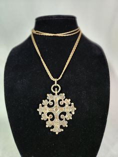 "Offered for sale is an beautiful Birks Italian Silver ornate Gothic/Renaissance Revival Cross pendant with bail and chain.  The pendant measures approximately 3 by 2.5 inches (3.5 with bail) and the necklace is approximately 30 inches.  The total weight is approximately 2.3 ounces.  The cross is ornately decorated.  This was given to my mother by a neighbor in the late 70's.  The pendant is Sterling Silver but the original owner had it Gold plated.   The pendant is stamped \"Sterling Birks made in Italy\".  Based on similar designs in found online I believe it dates to the 1930's.  I had the cahin tested and it is not gold, the jeweler said it looks to be gold filled." Bohemian Gold Cross Pendant Jewelry, Silver Brass Chain Necklace With Large Pendant, Antique Brass Cross Pendant Necklace, Ornate Gold Cross Pendant Necklace, Antique Cross Necklace With Large Pendant, Ornate Bronze Jewelry With Large Pendant, Traditional Cross Necklace With Large Pendant, Traditional Cross Pendant Necklace With Large Pendant, Traditional Cross Pendant Necklace With Intricate Design