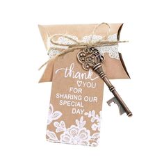 a key that is attached to a tag with the words thank you for sharing our special day