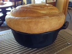 a loaf of bread sitting on top of a cooling rack