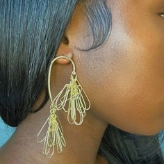 Be the centerpiece of convos with these oh-so-lightweight gilded danglers! This fashionable accessory is an absolute must-have for all events. Gold Chandelier Earrings With Ear Wire For Party, Party Brass Dangle Plug Earrings, Brass Wrap Earrings For Party, Gold-tone Dangle Hoop Earrings For Party, Gold Teardrop Chandelier Clip-on Earrings, Gold Teardrop Clip-on Chandelier Earrings, Brass Dangle Hoop Earrings For Party, Party Brass Dangle Hoop Earrings, Nickel-free Dangle Wrap Earrings For Party