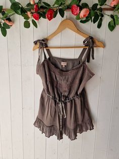 "Gorgeous taupe brown silk camisole tilop in Silk, by Whistles  Size UK14 US10 Very good condition  Manequin size UK8 for ref Zip side Gathered waist with ribbon and lace Rouching and self tie shoulder straps Measurements: taken flat  Pit to pit 18\" Waist 15\" Length 22\" All orders are shipped using biodegradable and recycled packaging where possible" Bohemian Sleeveless Top With Tie Straps, Brown Camisole With Tank Straps For Spring, Brown Sleeveless Top With Lace Trim, Brown Tops With Adjustable Straps For Summer, Brown Summer Camisole With Tank Straps, Brown Camisole With Tank Straps For Summer, Brown Tank Strap Camisole For Summer, Granola Aesthetic, Summer Swag