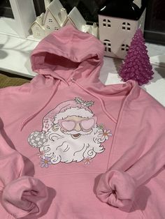 New and trendy hoodie sweatshirt  Size M Pink color  printed Pink Disco Santa Clause Trendy Winter Sweatshirt With Drawstring Hood, Pink Fleece Hoodie With Graphic Print, Graphic Print Hoodie Sweater For Winter, Trendy Cozy Fit Hoodie With Crew Neck, Trendy Crew Neck Hoodie With Cozy Fit, Winter Graphic Print Hoodie Sweatshirt, Graphic Print Hooded Fleece Sweater, Winter Graphic Print Hooded Top, Winter Hooded Top With Graphic Print