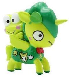 a green toy with two eyes on it's face and arms around another toy