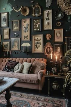 a living room filled with lots of pictures on the wall above a couch and coffee table