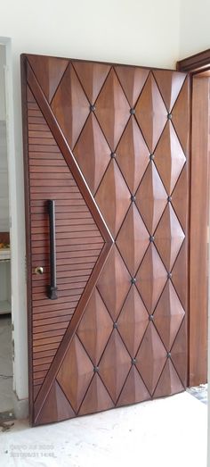 a wooden door with an intricate design on it