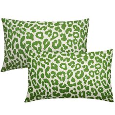 two green and white leopard print pillows