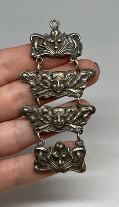 Beautiful antique Art Nouveau silver watch fob. Four links--two of which picture ladies faces with flowing hair. Art Nouveau Silver, Flowing Hair, Organic Shapes, Antique Art, Woman Face, Silver Watch, Art Inspo, Art Nouveau, Vintage Jewelry