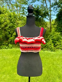 Womens size extra small/petite ruffle crocheted striped crop top. Perfect for a petite woman or teen or a girl from age 10-13.  Fun to wear at a pool party, the beach, out at a fair or festival or a night out clubbing. This 70s retro hippie crop top would look great with some Jean shorts or a skirt.  Super cute and comfortable. Shoulder straps. Reversible wear, so it's versatile for how you want to show the stripes off. Ruffled top is adorable.   Made from acrylic yarn. It's machine washable in Fitted Ruffle Crop Top For Vacation, Trendy Crochet Tank Top For Summer, Summer Striped Fitted Crop Top, Trendy Crochet Summer Tank Top, Striped Sleeveless Crop Top For Beach, Striped Fitted Crop Top For Summer, Striped Fitted Halter Top For Summer, Bohemian Ruffled Crop Top For Beach, Fitted Striped Halter Top For Summer