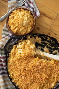 two dishes of macaroni and cheese on a table