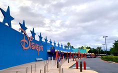 the entrance to disney's all - star resort is blue and has stars on it