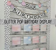 a birthday display with the words our birthday's glitter pop birthday display on it