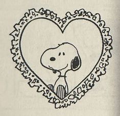 a drawing of a dog in a heart frame