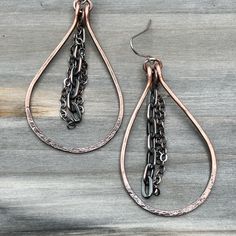 Copper dangle earrings. Sterling Silver ear wires.   Hand forged copper that has been antiqued & tumbled. A protective clear coat has been applied to the copper so it will not tarnish.  To protect the clear coat do not wear the earrings in the shower. Length: 7 cm Drop Length: 6 cm Widest Part: 3.75 cm Each earring is individually handcrafted by myself using only high quality materials. Rose Gold Dangle Teardrop Earrings, Copper Chandelier Dangle Earrings For Pierced Ears, Teardrop Pendant Chandelier Earrings As Gift, Hypoallergenic Copper Dangle Earrings, Gift Chandelier Earrings With Teardrop Pendant, Metal Long Drop Hoop Earrings As Gift, Teardrop Metal Wrap Earrings As Gift, Metal Hoop Earrings For Gift, Teardrop Chandelier Earrings For Jewelry Making