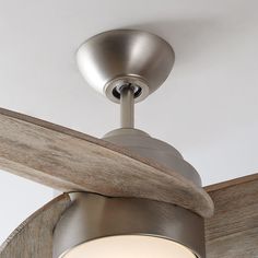 a ceiling fan with a light on top of it