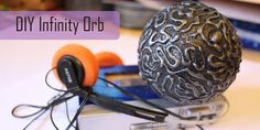 an egg with headphones on top of it and the words diy infinity orb