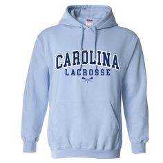 Gildan Carolina Blue Hoodie 8.0 oz. Heavy Blend Hooded Pullover. Double-lined hood with matching drawstring. Set-in sleeves. Double-needle throughout. 1x1 athletic rib with spandex, pouch pocket. Two color screen print on front. Original design copyright Teamzila 2022. Sports Sweatshirt With Drawstring Hood In Solid Color, Casual Activewear With Drawstring Hood For Sports Events, Blue Sports Hoodie With Drawstring Hood, Sporty Blue Sweats With Double-lined Hood, Sporty Sweatshirt With Drawstring Hood For Sports Season, Moisture-wicking Long Sleeve Hoodie Fan Apparel, Moisture-wicking Long Sleeve Fan Hoodie, Sports Fan Hoodie For Winter, Blue Sports Sweatshirt With Drawstring Hood