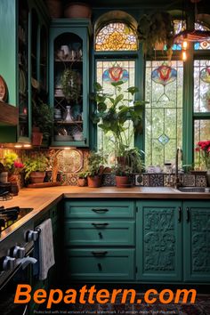 a kitchen with green cabinets and lots of potted plants in the window sill