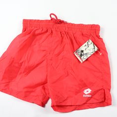 Vintage 90s Lotto Soccer Shorts Soccer Shorts Brand New The Size Is Youth Large Measurements Are: 4 Inch Inseam 12 Inch Overall Length 9.5 Inch Waist Red Nylon Check Out My Other Items For Sale In My Store! Bin 5/Youth Red Summer Sports Bottoms, Retro Red Bottoms For Streetwear, Red Short Swim Trunks For Spring, Red Shorts With Elastic Waistband For Swimming, Red Elastic Waistband Shorts For Swimming, Red Casual Swim Trunks With Elastic Waistband, Red Nylon Bottoms Of Short Length, Vintage Red Bottoms For Beach, Retro Red Sports Bottoms