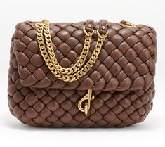 Give us all the details! With an elevated woven design, shiny chain strap, and mid-size that carries more than a clutch, this Edie leather bag delivers a wow moment on repeat. From Rebecca Minkoff. Quilted Bags, Rebecca Minkoff Handbags, Flap Shoulder Bag, Woven Design, Mid Size, Quilted Bag, Hobo Handbags, On Repeat, Brown Suede