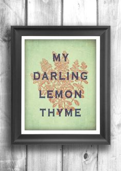 a framed print with the words, my darling lemon thyme in orange and green