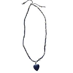 This handcrafted necklace is 18 inches in length closing with an alligator clasp at the back and features silver and  glass beading on natural hemp macrame thread with a beautiful blue sandstone glass heart pendant centerpiece. This necklace would make a great handmade piece for any necklace lover in your life💙 Length: 18 Inches Condition: Handmade, Brand New Color: Black, Blue, Silver Material: Glass Beading, Silver Beading, Black Hemp Thread, Alligator Closure, Blue Sandstone Heart Pendant Adjustable Spiritual Beaded Necklace With Heart Beads, Blue Adjustable Heart-shaped Beaded Necklaces, Adjustable Blue Heart Beaded Necklaces, Adjustable Blue Heart-shaped Beaded Necklaces, Adjustable Beaded Necklace With Heart Pendant, Adjustable Blue Heart-shaped Beaded Necklace, Bohemian Lapis Lazuli Beaded Necklace With Adjustable Fit, Adjustable Heart Beads Pendant Jewelry, Adjustable Bohemian Lapis Lazuli Beaded Necklace