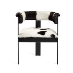 a chair with black and white fur on it