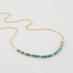 This Delicate Turquoise Beaded Necklace is handcrafted for you with great care. Featuring beautiful Natural Heshi Turquoise Beads the necklace has a delicate and feminine look. It will be a great addition to your jewelry collection and a great gift for your December birthday! MATERIALS AND SIZE ◆ Metal - 14K Gold Filled, 925 Sterling Silver  ◆ NECKLACE LENGTH = the total circumference of the necklace including the clasp, while the pendant size is specified in each listing.      Please check the Turquoise Beaded Chain Necklace Gift, Handmade Turquoise Beaded Necklaces For Everyday, Green Turquoise Beaded Necklace As Gift, Everyday Handmade Turquoise Beaded Necklace, Turquoise Beaded Necklaces With Round Beads For Everyday, Everyday Turquoise Beaded Necklace With Tiny Beads, Turquoise Necklace With Tiny Beads For Everyday Wear, Turquoise Necklace With Tiny Beads As A Gift, Green Turquoise Necklace With Tiny Beads For Gift