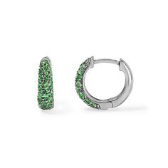 A classic twist on the pave huggie earring for a timeless accessory that embodies understated refinement. Crafted from gleaming gold and sparkling green tsavorites, these earrings feature a snug, hoop-like design that "hugs" the earlobe closely. Their simplicity and versatility make them an essential addition to any jewelry collection, effortlessly complementing both casual and formal looks. Available in 14K White, Yellow, and Rose Gold Green Tsavorite weight = 0.53 carats Inner Diameter = 9mm x Green Small Hoop Huggie Earrings Fine Jewelry, Green Gemstone Huggie Earrings, Green Small Hoop Huggie Earrings, Green Huggie Fine Jewelry Earrings, Green Huggie Earrings Fine Jewelry, Green Huggie Earrings With Prong Setting, Stephanie Gottlieb, Candy Buttons, Huggie Earring