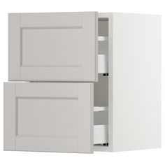 a white cabinet with two doors and drawers