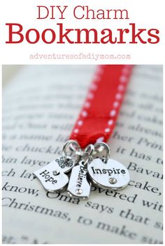 a bookmark with two charms on it and the words, diy charm bookmarks