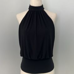 Dressy Tank. Halter Neck With Cut Out Back. Black. Nwt! Elegant Evening Halter Tank Top, Solid Color Sleeveless Top For Evening, Solid Halter Neck Top For Night Out, Chic Black Sleeveless Halter Top, Solid Color Tank Top For Party, Elegant Tank Halter Top For Night Out, Elegant Halter Tank Top For Night Out, Stretch Sleeveless Tops For Date Night, Elegant Black Sleeveless Halter Top