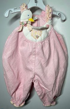 "Labeled sz 12 months- a front appliquéd goose with a fold over wing showing a heart underneath.Pink corduroy with elastic leg cuffs / snap crotch for easy changing / pit to pit 11\"/ length (shoulder to bottom leg) 21\" / Overalls labeled 12 months - 100 % cotton /inseam 7 1/2\" / Smoke free environment (157)" Spring Pink Bib Front Overalls, Pink Cotton Bib Front Overalls, 80s Overalls, Overalls Corduroy, Pink Overalls, Corduroy Overall, Vintage Kids Clothes, Infant Baby Girl, Vintage Overalls