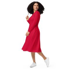 Meet your new favorite red dress! Its soft fabric and flattering cut will ensure you feel comfortable and feminine all day long. Plus, the fitted waist and flared bottom part of the dress will accentuate the wearer's naturally beautiful silhouette. The best part about the dress? It. Has. Pockets.   * 95% polyester, 5% elastane (fabric composition may vary by 1%)  * Fabric weight: 6.19 oz/yd2 (210 g/m2) (weight may vary by 5%)  * Premium knit mid-weight jersey fabric  * Midi length  * Long sleeve Red A-line Midi Dress For Winter, Red A-line Christmas Dress, Fitted Midi Dress For Christmas, Fitted Red Long Sleeve Holiday Dress, Red Fitted Long Sleeve Holiday Dress, Red Long Sleeve Fitted Holiday Dress, Fitted Red Holiday Dress With Long Sleeves, Elegant Solid Color Dress For Holiday, Red A-line Fit And Flare Dress