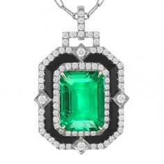 METAL SPECIFICATIONS Multi Tone Gold 14K STONE SPECIFICATIONS Stone Name : Green Emerald and Diamond Stone Cut : Emerald and Round Cut Stone Details : There is one emerald cut green emerald stone approx. 3.50 carats (Approx. Size 9 x 7 mm) in the middle and approx. 1 carat of round cut diamonds along the sides. Crafted with natural earth mined stones. Color : Green/F Clarity : VS1 Quality of Green Emerald : AAA Total : Approx. 4.50 Carats PENDANT SPECIFICATIONS Length : 16” (Can change length, please indicate about change with payment) Overall Size: Approx. 3/4 Inches (21 mm) x 5/8 Inches (16 mm) Including Bale Appraised Value : $19,548.00 Comes with Certificate Luxury Emerald Necklace With Jewels For Formal Occasions, Luxury Emerald Necklace With Jewels For Formal Events, Luxury Emerald Necklace For Formal Events, Luxury Emerald Pendant Necklace For Formal Occasions, Green Gemstone Necklace For Evening, Classic Emerald Jewelry For Evening, Classic Evening Emerald Jewelry, Timeless Green Jewelry For Evening, Timeless Green Evening Jewelry