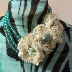 Beautiful Triple Strand Of Aqua Beads With Three Gauze Flowers Showcasing Various Ornamental Themes. Reminds Me Of A Tropical Vacation! Handmade Beige Necklace For Party, Cream Bohemian Jewelry For Party, Bohemian Cream Jewelry For Party, Handmade Cream Necklace For Party, Lace Ideas, Aqua Beads, Denim Jewelry, Tropical Vacation, Vintage Lace