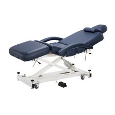 Equipro Divine EI-504 - Multi-Purpose Therapeutic Massage & Facial Treatment Table & Bed Sturdily built and comfortable, the Equipro Divine Spa Table is a treat for both esthetician and client. Featuring four padded cushions, it provides support and ample room for clients to relax during their treatment, whether they are getting a facial, depilation, electrolysis or other therapeutic treatment. Featuring silent operation, it has an electric adjustment for the height (it can be adjusted f Getting A Facial, Spa Table, Facial Bed, Zero Gravity Recliner, Portable Spa, Massage Tables, Spa Packages, Table Bed, Furniture Packages