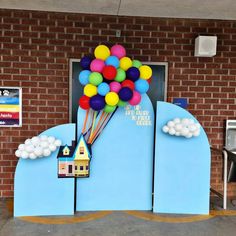 a building with balloons attached to the doors