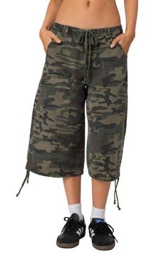 Channel laid-back skater style with these baggy cotton-twill Bermuda shorts in a camo pattern. Drawstrings cinch the waist and hems for next-level coolness. Zip fly with button closure Drawstring waist Front slant pockets; back flap-patch pocket; cargo flap-patch pocket Drawstring hems 100% cotton Machine wash, line dry Imported Cargo Bermuda Shorts, Bermuda Shorts Women, Swimsuit Cover Up Dress, Concert Fits, Skater Style, Designer Clothes For Men, Casual Coat, Casual Socks, Toddler Girl Outfits