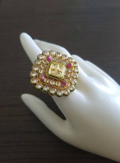 Bollywood designer kundan  ring  with gold plating are beautiful, elegent & will surely galvanize you, Adjustable Finger ring this Gold kundan ring looks beautiful  and elegant perfect for all occasion on any outfits you choose to wear (saree, salwar suits, lenga, etc.) *High quality craftsmanship 100% satisfaction guarantee  *Plated in Gold plating *adjustable finger ring *base metal for ring is copper *package include polki kundan ring *ready to ship from Houston TX United States GIFT- It comes in gift box perfect for gifting to your mom , sister, in laws, friends, on there birthday, wedding , bridal shower, anniversary, festival , and many more... Discover a variety of Necklace sets and Earring  only at Azzashiny.fj . our product are made from metal & alloys like Copper or Brass respect Indian Gold Ring, Wedding Jewelry Gold, Ring Indian, Gold Finger Rings, Gold Jewelry Gift, Kundan Jewelry, Gold Wedding Jewelry, Black Beaded Jewelry, Jewelry Indian