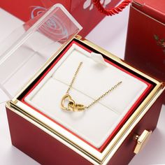 Elevate Your Style with the Unique Twisted Rose Gift Box Custom Engraved Heart Name Necklace Discover a truly one-of-a-kind piece of personalized jewelry that beautifully marries a heart pendant with an enchanting twisted rose gift box. Dive into the intricate details of this exquisite necklace: Pendants and Necklaces: This necklace boasts two meticulously crafted heart pendants fashioned from top-tier stainless steel. Each pendant receives an elegant engraving of your choice, rendered in a graceful font, adding a personalized touch. It dangles gracefully from a coordinating stainless steel chain, harmonizing flawlessly with the pendant's design. Rotating Rose Gift Box: Embrace the allure of the necklace's presentation with a captivating swirling rose gift box. Designed to securely cradle Rosen Box, Eternal Rose, Rose Gift, Custom Name Necklace, Necklace Box, Silver 925 Necklace, Gifts For Your Girlfriend, Double Heart, Engraved Necklace