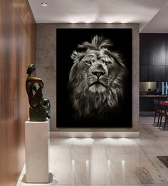 a lion's face is shown on the wall in this modern living room with marble flooring